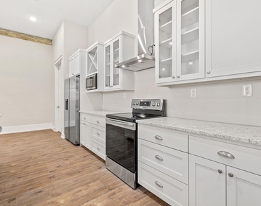 104 E 2nd St - Photo Thumbnail 15