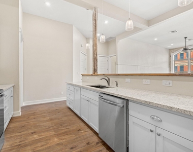 104 E 2nd St - Photo Thumbnail 13
