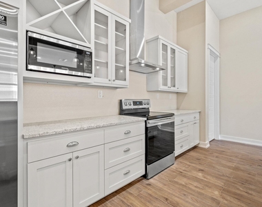 104 E 2nd St - Photo Thumbnail 12