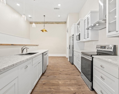104 E 2nd St - Photo Thumbnail 16