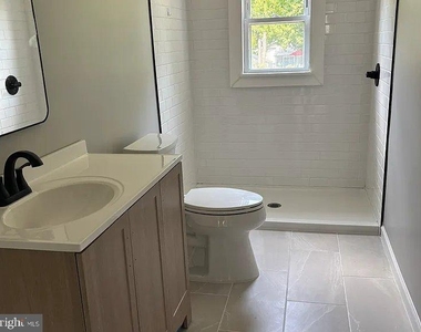 9940 Naylor Avenue - Photo Thumbnail 11