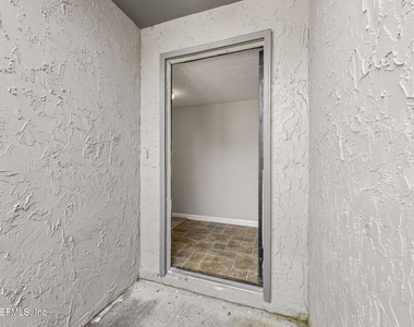 8745 Whispering Pines Drive - Photo Thumbnail 3