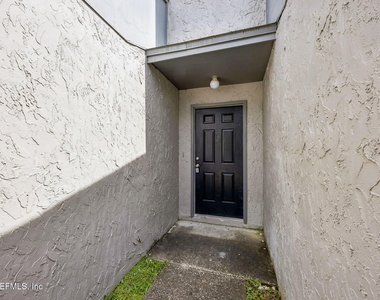 8745 Whispering Pines Drive - Photo Thumbnail 2