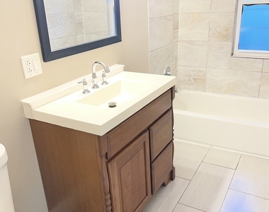 331 W 61st Street - Photo Thumbnail 2
