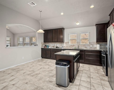 13607 Kodiak Brown Bear Street - Photo Thumbnail 2