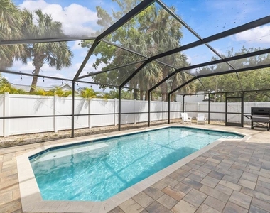 7318 S Kissimmee Street - Photo Thumbnail 3