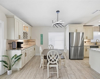 7318 S Kissimmee Street - Photo Thumbnail 7