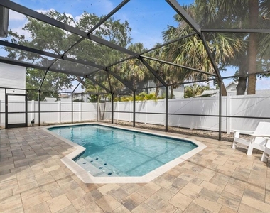 7318 S Kissimmee Street - Photo Thumbnail 2