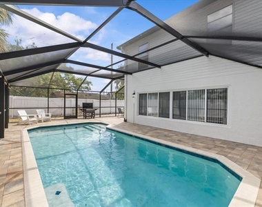 7318 S Kissimmee Street - Photo Thumbnail 4