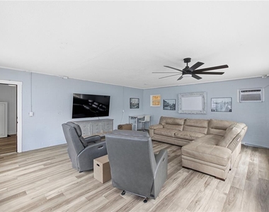 7318 S Kissimmee Street - Photo Thumbnail 30