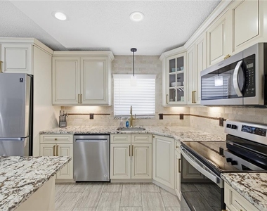 7318 S Kissimmee Street - Photo Thumbnail 9