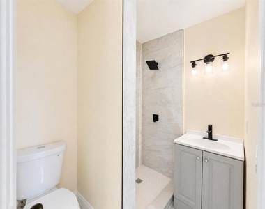 5633 Crissman Drive N - Photo Thumbnail 3