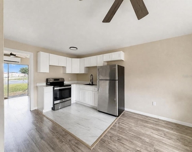 5633 Crissman Drive N - Photo Thumbnail 1