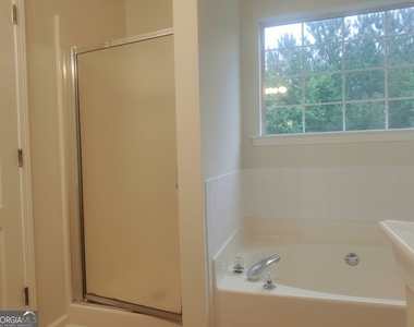 10600 Redbud Lane - Photo Thumbnail 9
