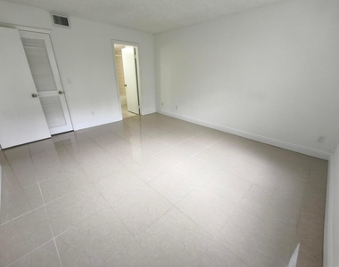 8720 Shadow Wood Boulevard - Photo Thumbnail 9