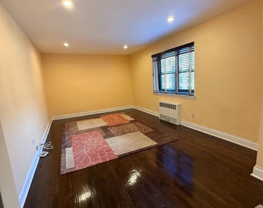 102-25 67th Road - Photo Thumbnail 1