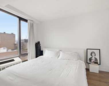 399 E 8th Street - Photo Thumbnail 3