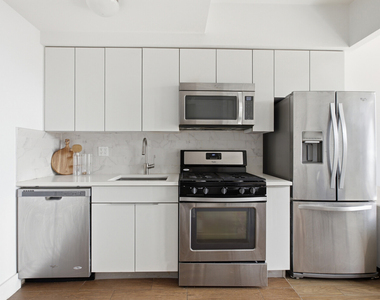 399 E 8th Street - Photo Thumbnail 2