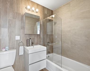 399 E 8th Street - Photo Thumbnail 4