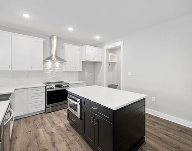 313 E 4th Street - Photo Thumbnail 7