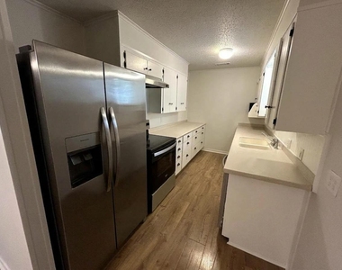 7603 Carriage Dr - Photo Thumbnail 6
