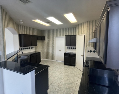 12522 Mesquite Hollow Lane - Photo Thumbnail 3