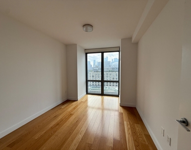 11th St &  West 57th Street - Photo Thumbnail 1