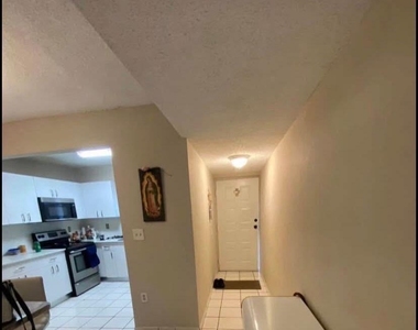 7835 W 30th Court - Photo Thumbnail 2