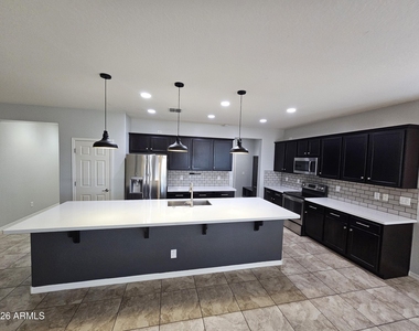 10155 W Los Gatos Drive - Photo Thumbnail 6