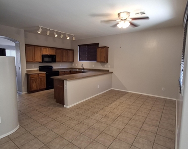 43947 W Palo Ceniza Way - Photo Thumbnail 13