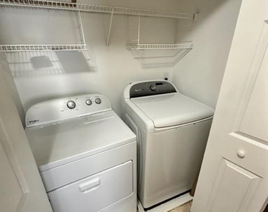 13607 Riding Hill Avenue - Photo Thumbnail 9