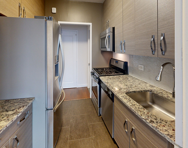 401 E 34th St - Photo Thumbnail 1
