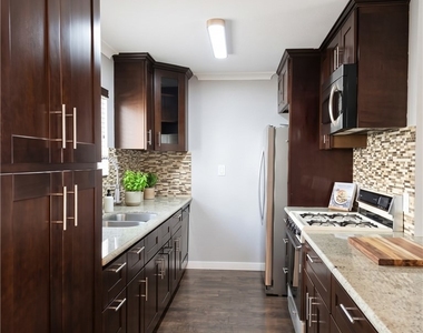6950 Remmet Avenue - Photo Thumbnail 4