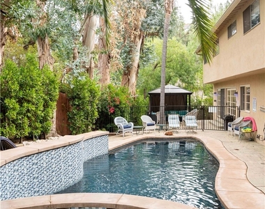 7703 Skyhill Drive - Photo Thumbnail 1