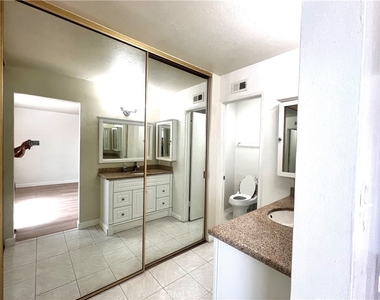 11000 Woodruff Avenue - Photo Thumbnail 5