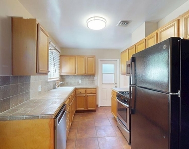 15031 Hartland Street - Photo Thumbnail 4