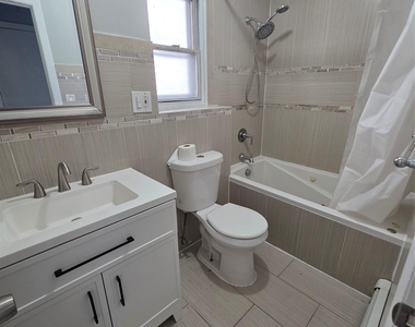 32-23 Plunkett Avenue - Photo Thumbnail 6