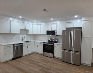 105 Village Road - Photo Thumbnail 2
