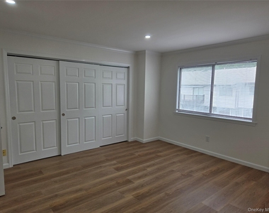 105 Village Road - Photo Thumbnail 9