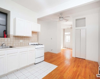 406 W 48th Street - Photo Thumbnail 2