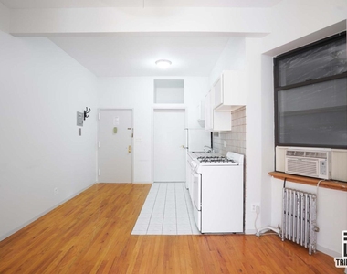 406 W 48th Street - Photo Thumbnail 4