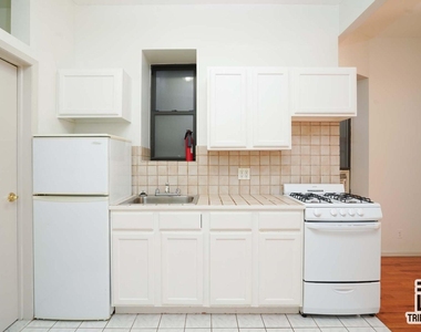 406 W 48th Street - Photo Thumbnail 1