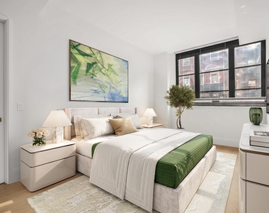 438 E 12th Street - Photo Thumbnail 2