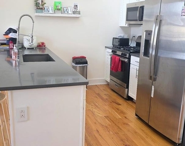 1003 N Bodine Street - Photo Thumbnail 13