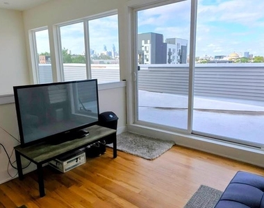 1003 N Bodine Street - Photo Thumbnail 1