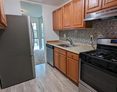 7318 Donnell Place - Photo Thumbnail 2