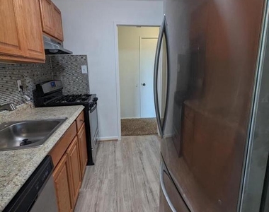7318 Donnell Place - Photo Thumbnail 3