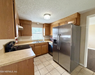 11947 Pequots Lane - Photo Thumbnail 1