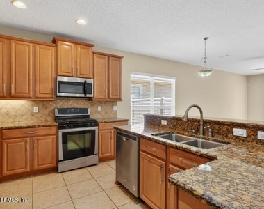 14733 Bulow Creek Drive - Photo Thumbnail 4