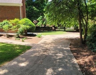 5005 Johns Creek Court - Photo Thumbnail 2